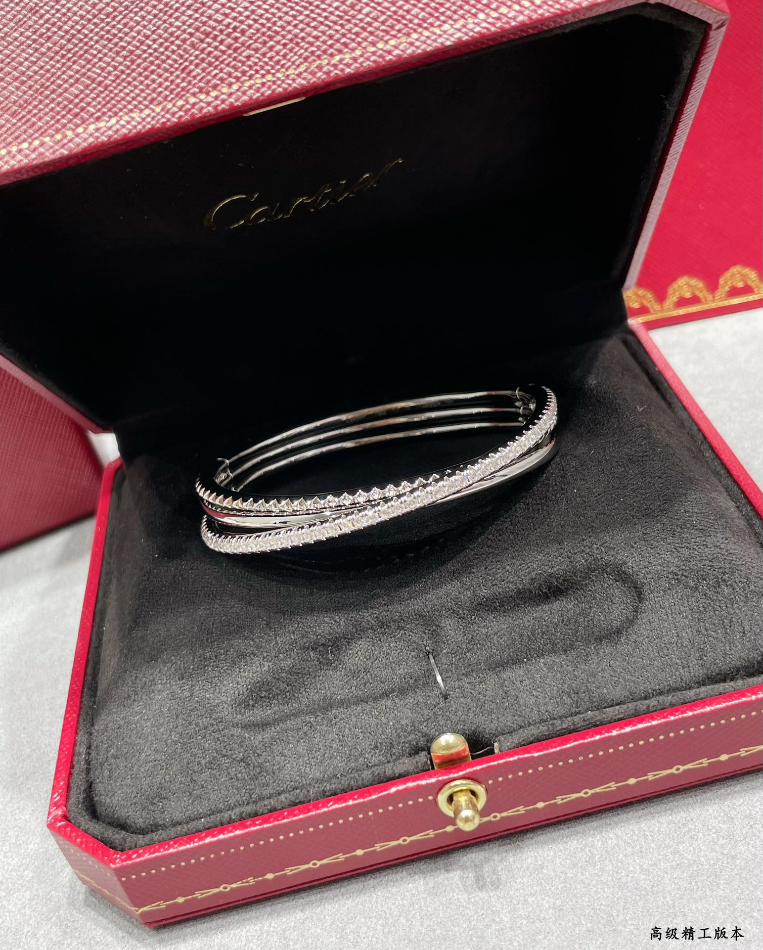 Ca*t*er three-ring rivet bracelet