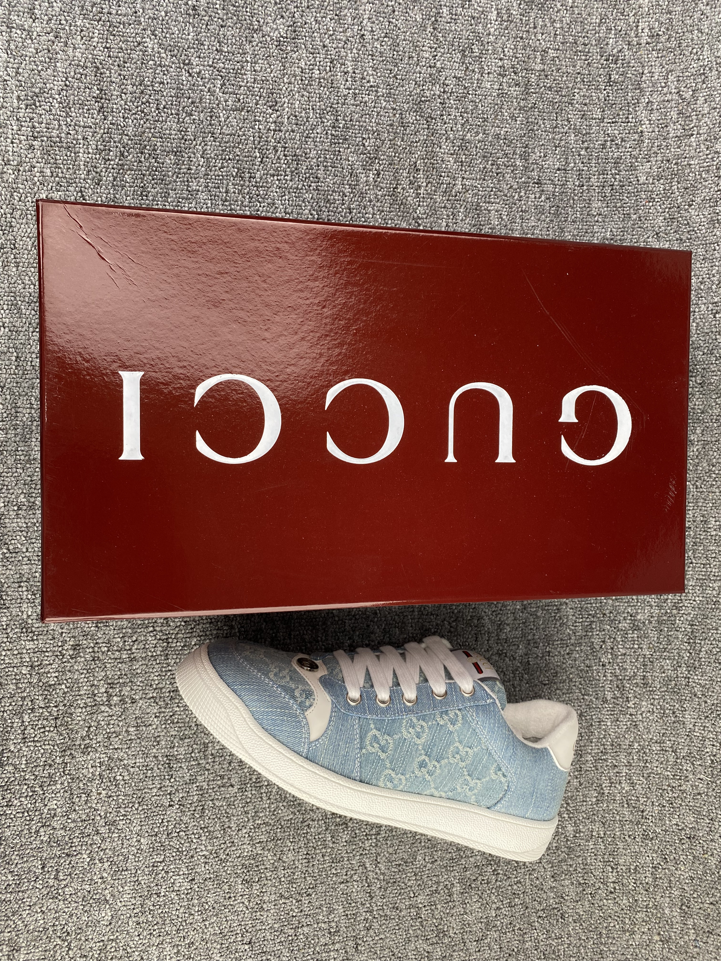 ua G*u*i sneakers