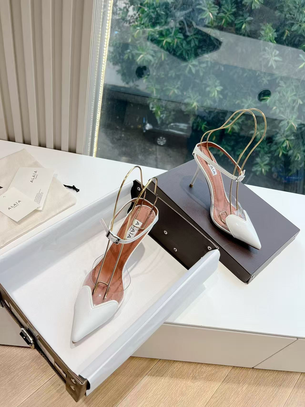 UA ALAÏA Patent Heart-Toe Stiletto Pumps
