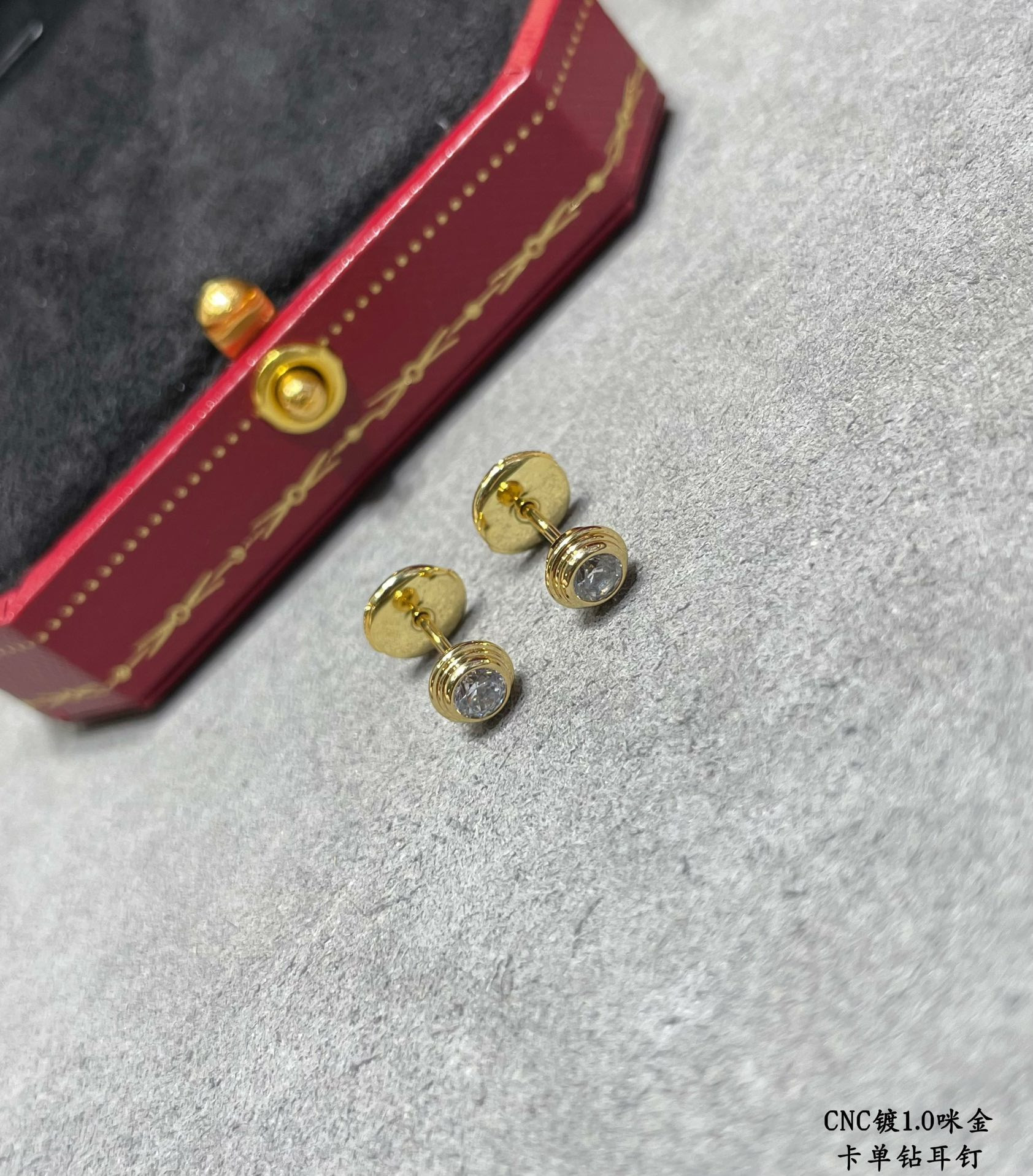 ca*t*er single Di*m*nd stud earrings
