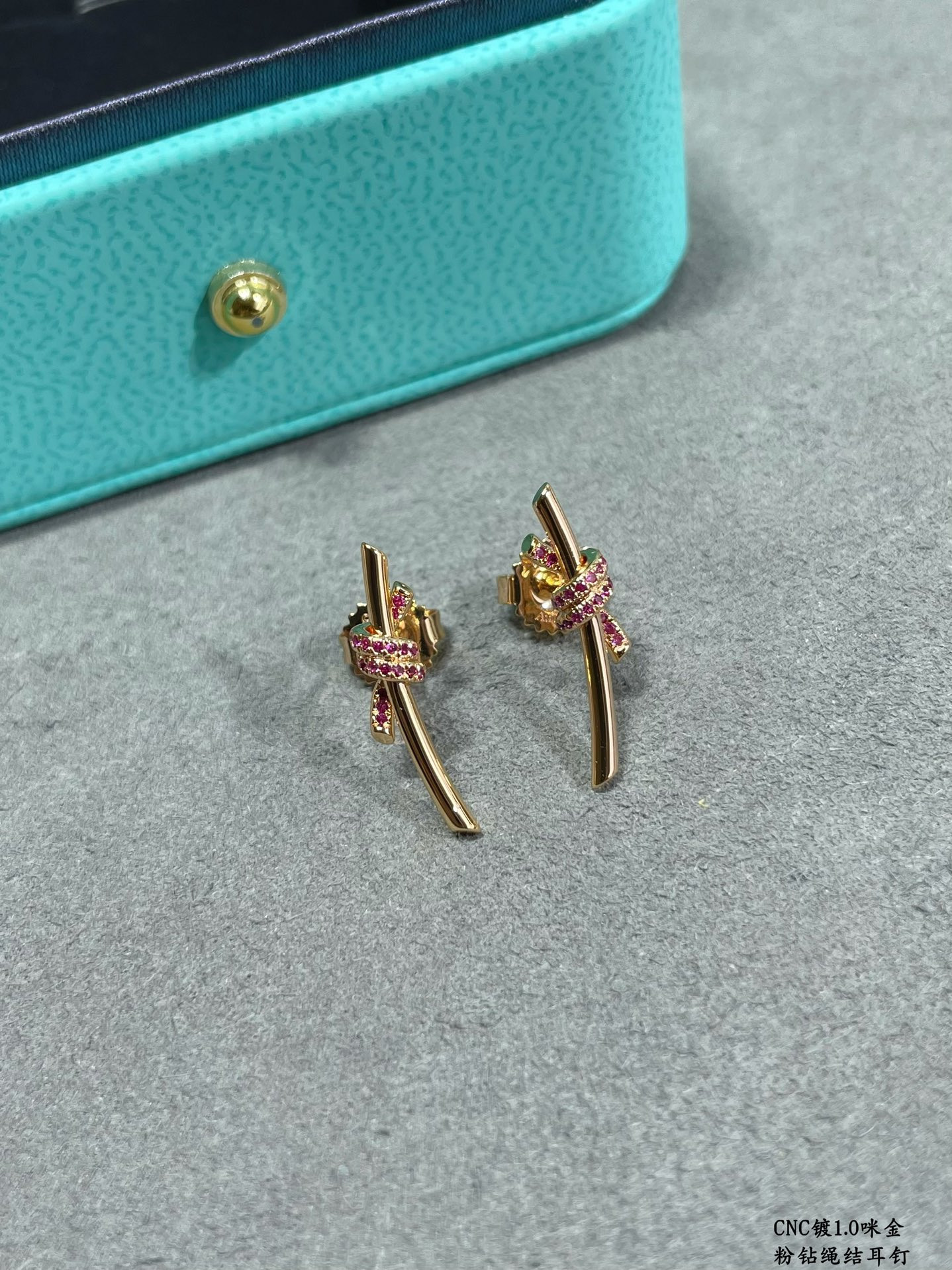 t*f*ny & co. pink Di*m*nd t wire knot stud earrings