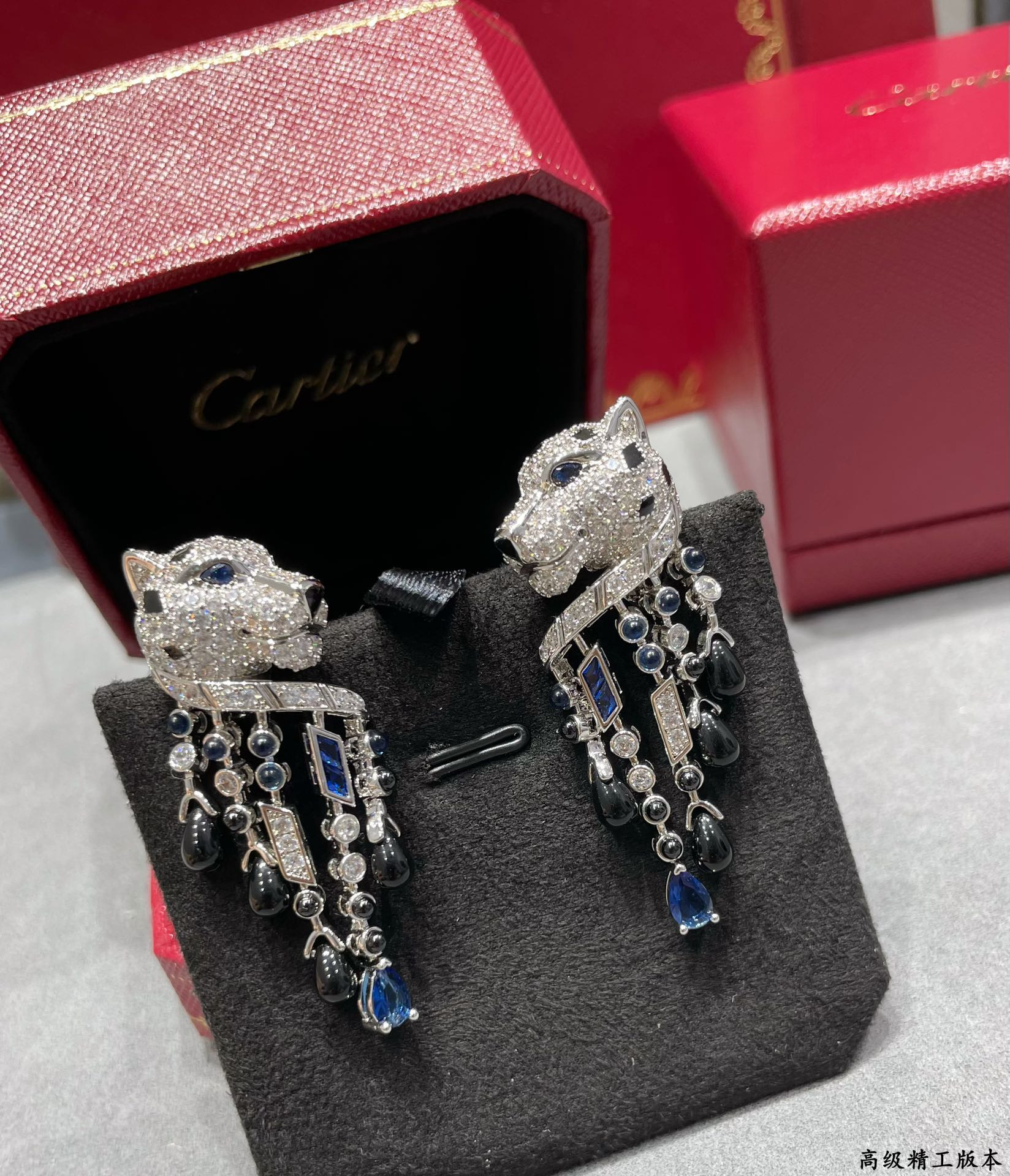 ca*t*er black onyx blue Di*m*nd leopard earrings