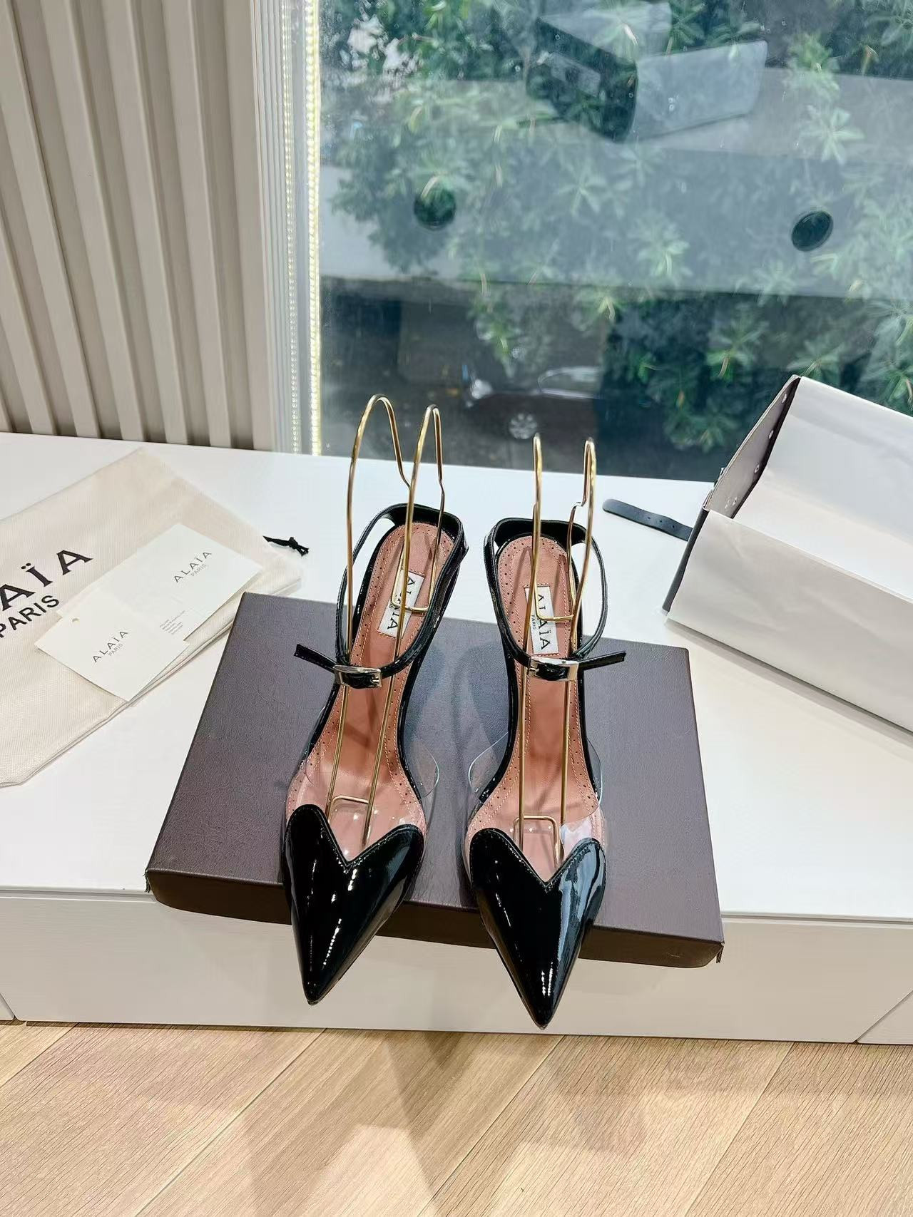 UA ALAÏA Patent Heart-Toe Stiletto Pumps