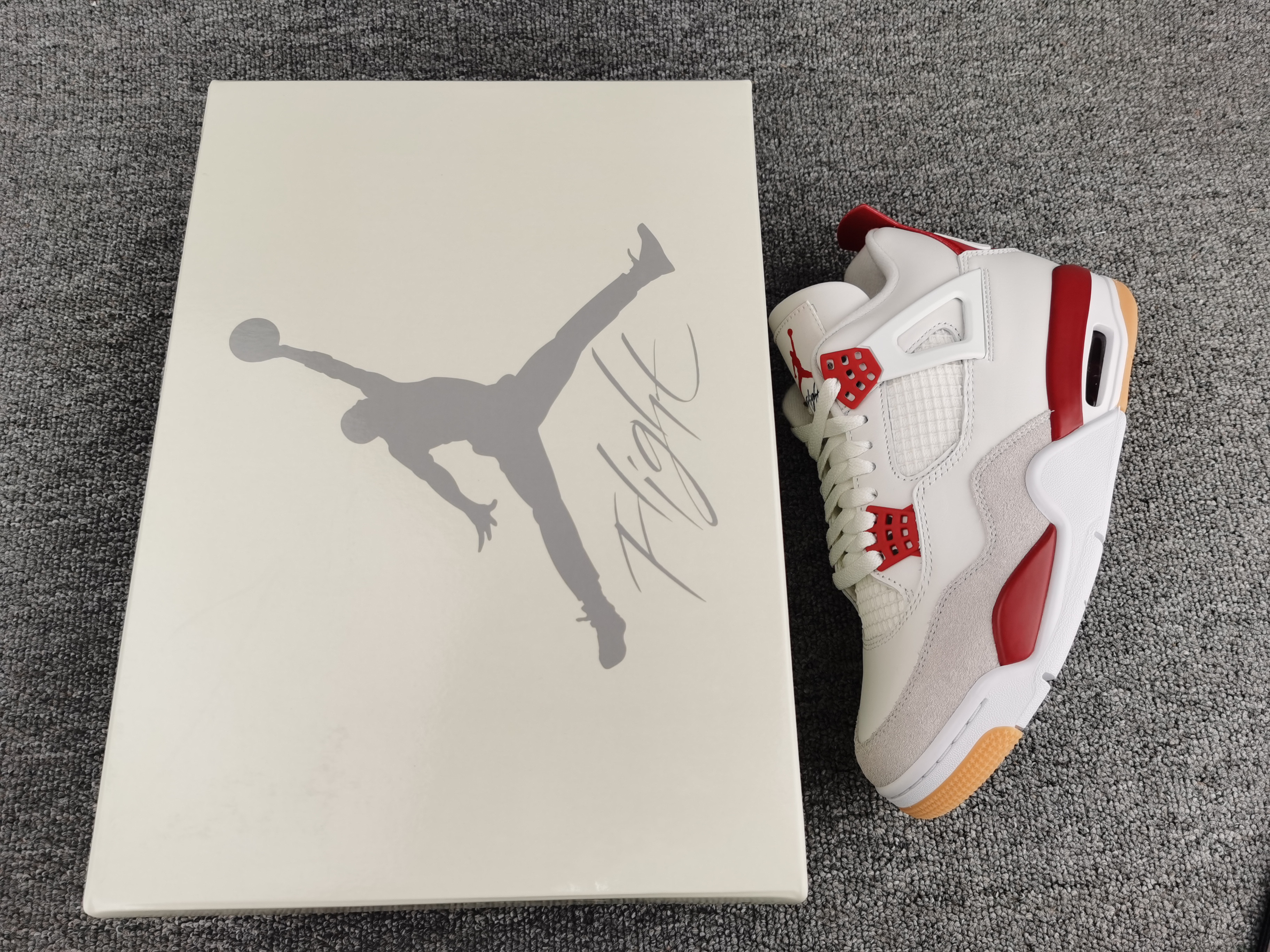 UA Jordan 4 Retro SB