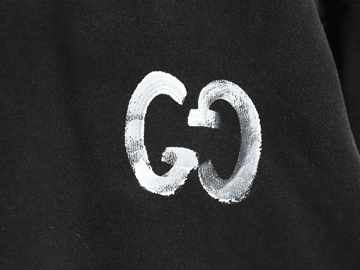 G*u*i hoodies