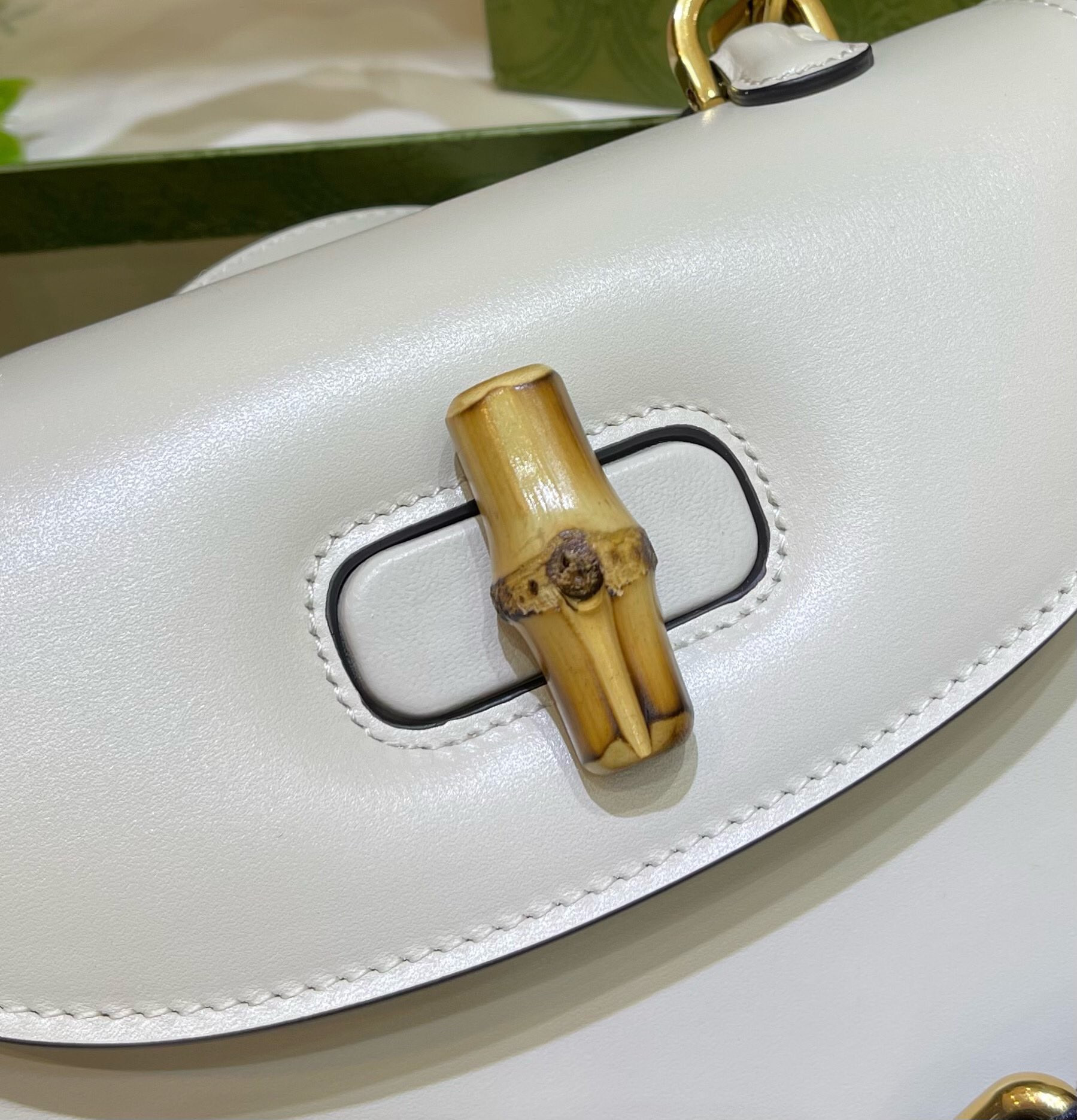G*u*i small bamboo tote