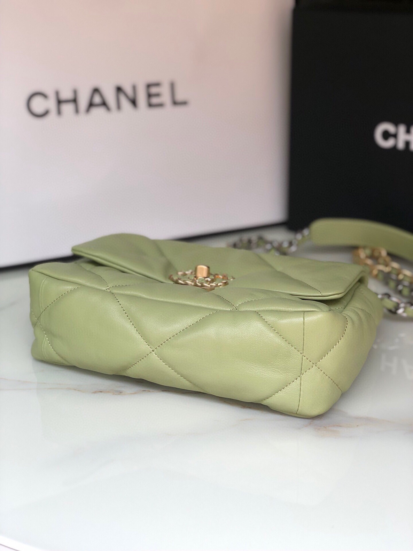 Ch*el 19 handbag shiny leather, gold-tone, silver-tone & ruthenium-finish metal light green 6.2 × 10.1 × 3.5 in
