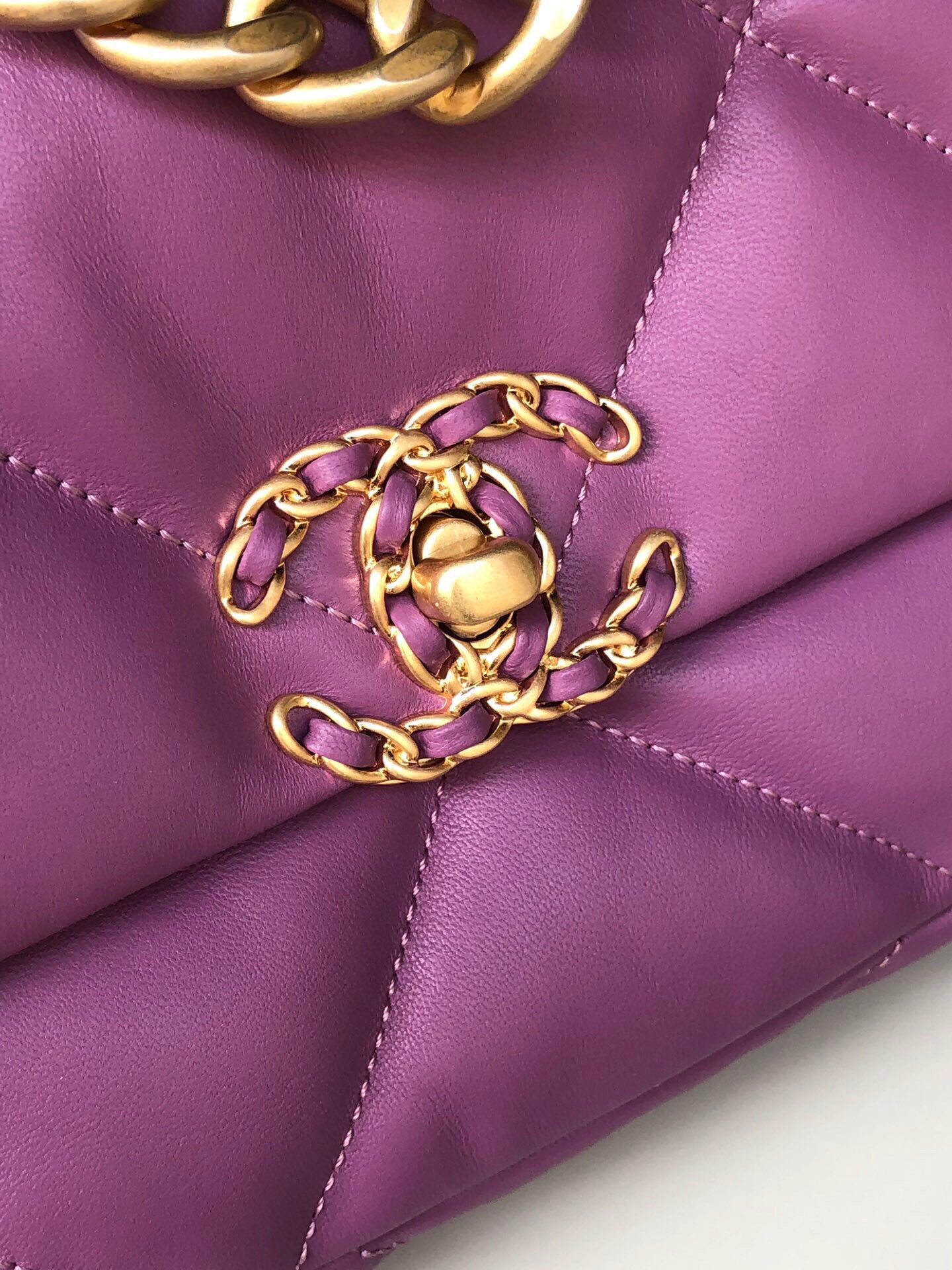 Ch*el 19 handbag shiny leather, gold-tone, silver-tone & ruthenium-finish metal purple 6.2 × 10.1 × 3.5 in