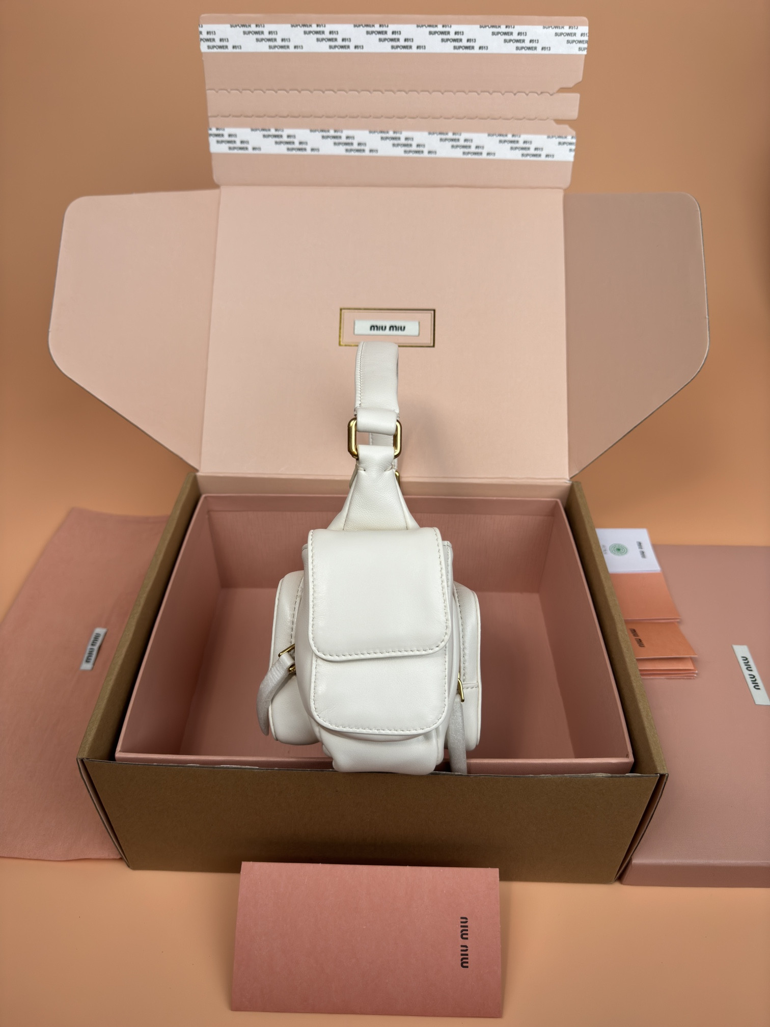 Miu Miu Hobo Nappa leather pocket bag  12x21x6cm